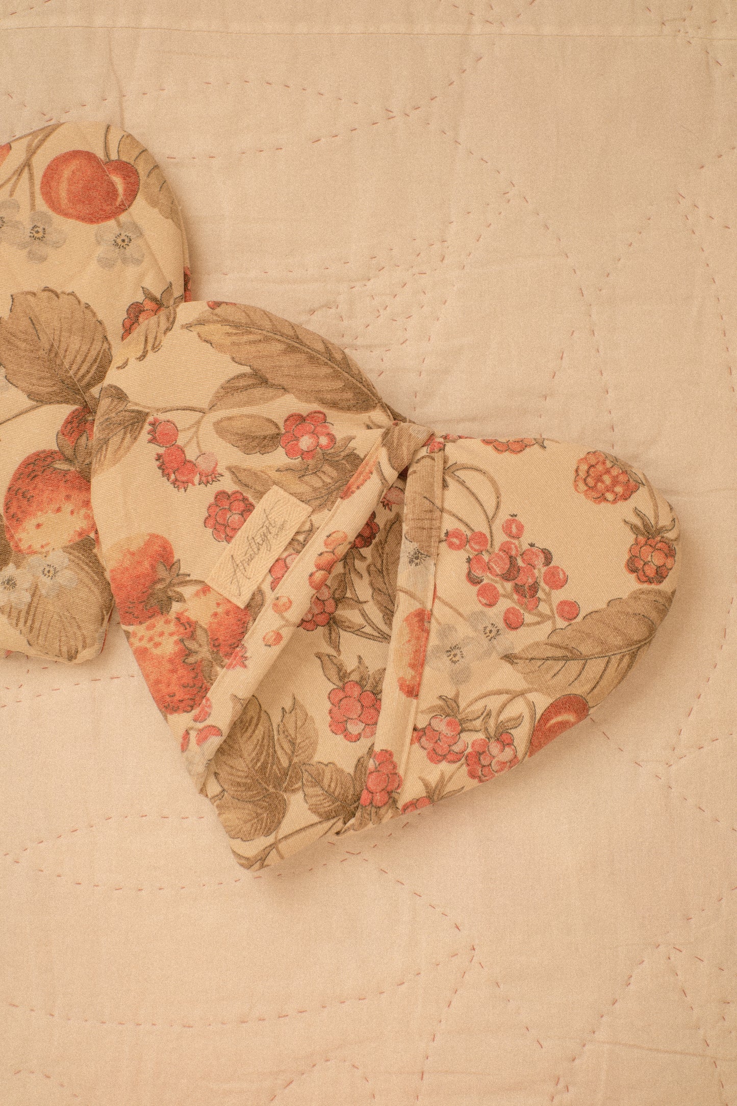 Handmade heart shaped oven mitts - fruit picking