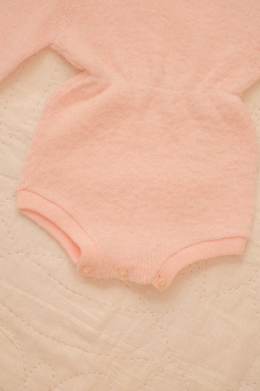 Vintage soft pink knit baby onesie