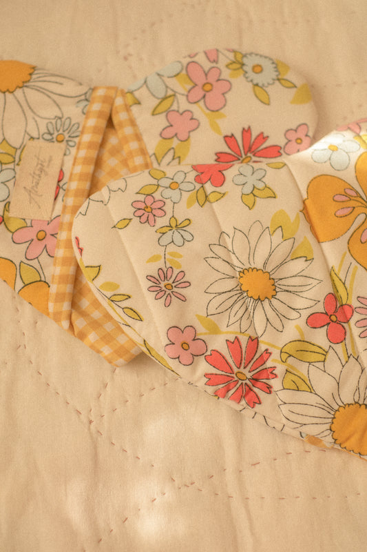 Handmade heart shaped oven mitts - picking daisies