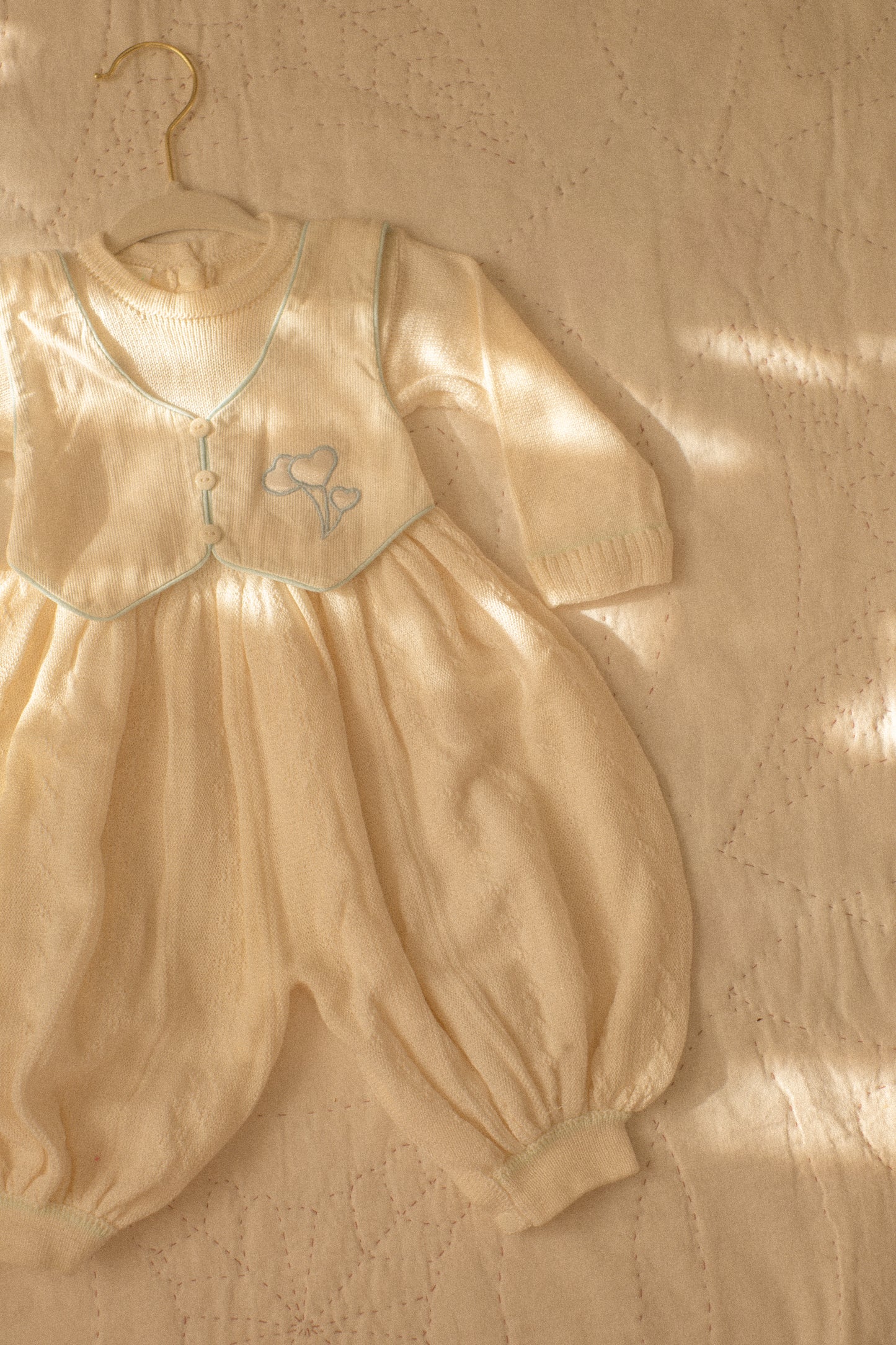 vintage knit baby onesie