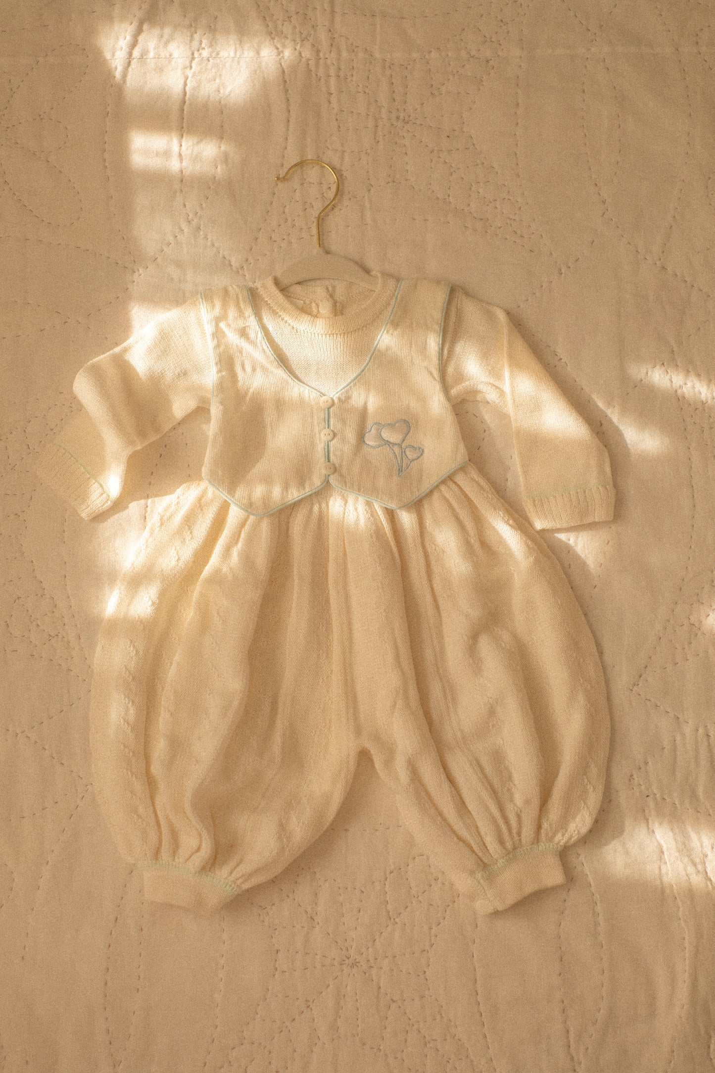 vintage knit baby onesie