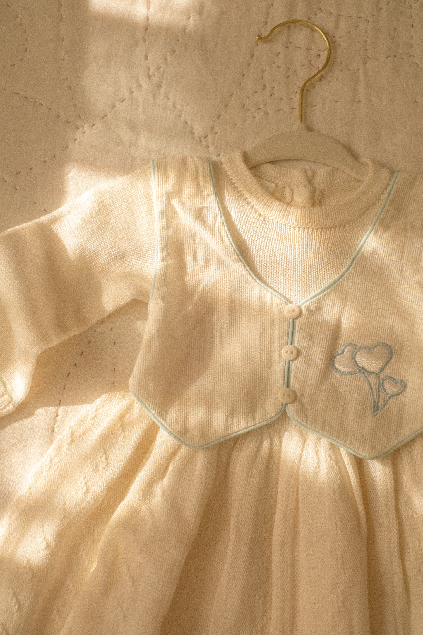 vintage knit baby onesie