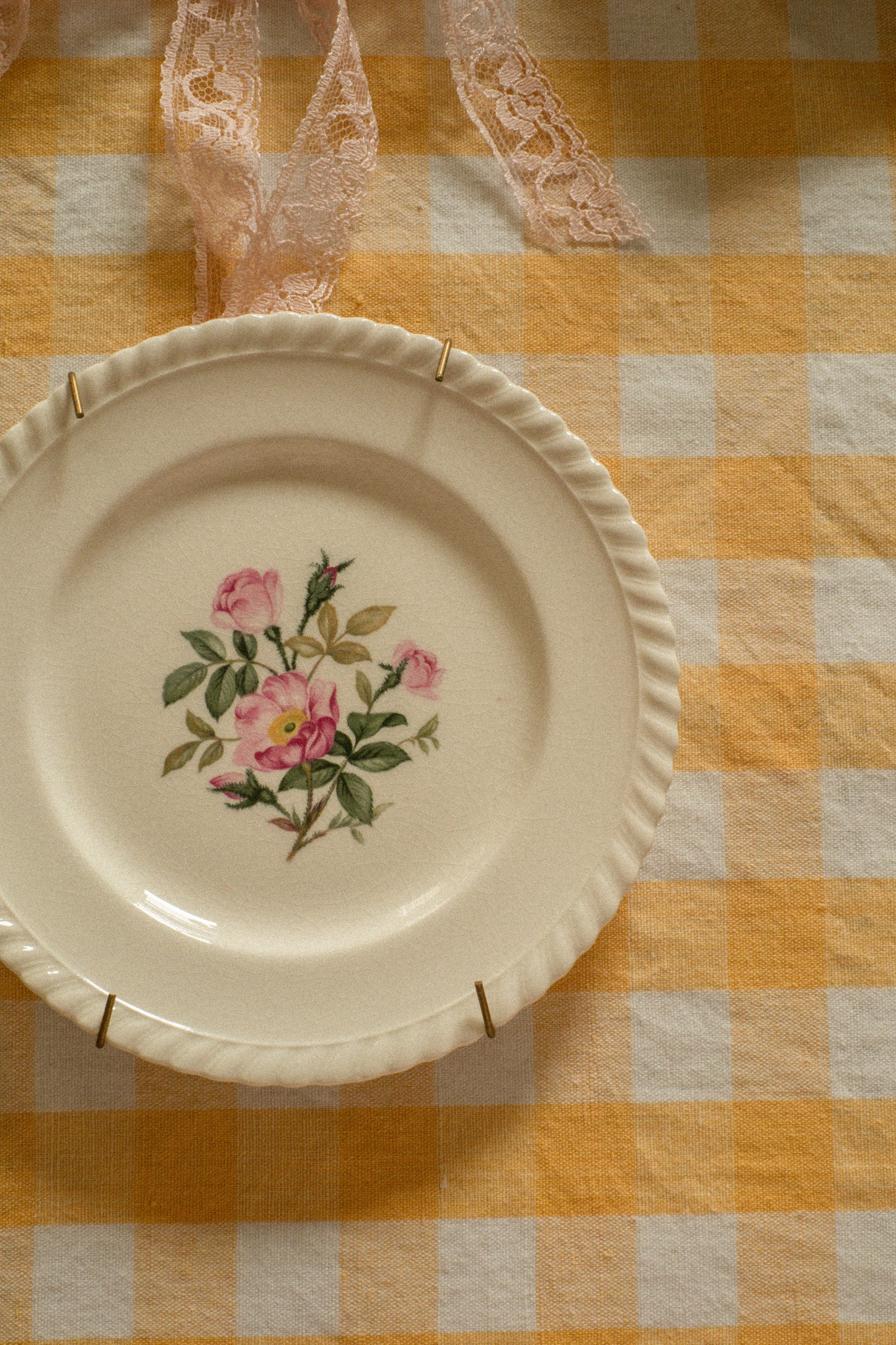 Vintage floral wall plate with bow