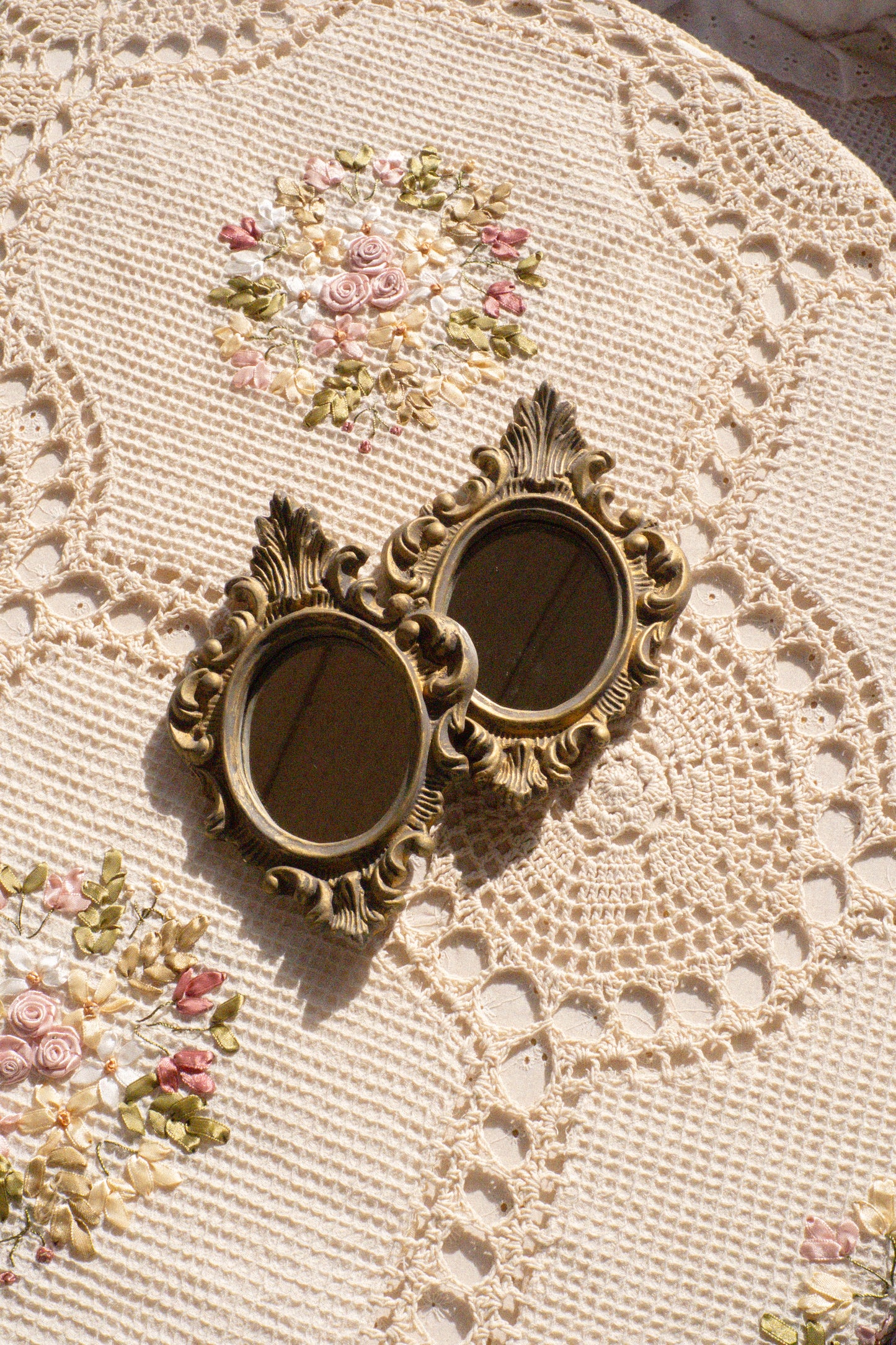 Pair of vintage ornate mirrors