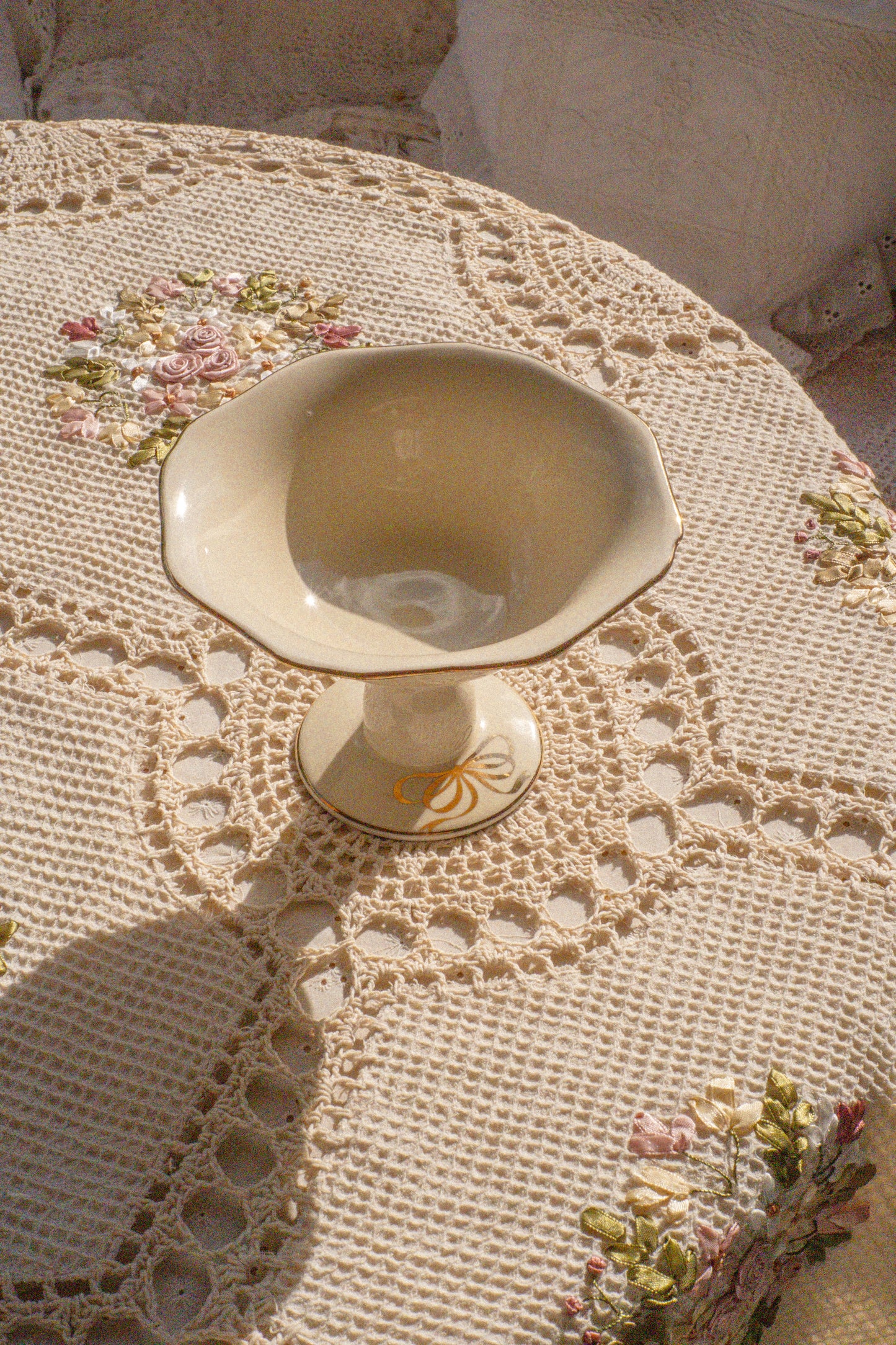 Vintage pedestal bow trinket dish