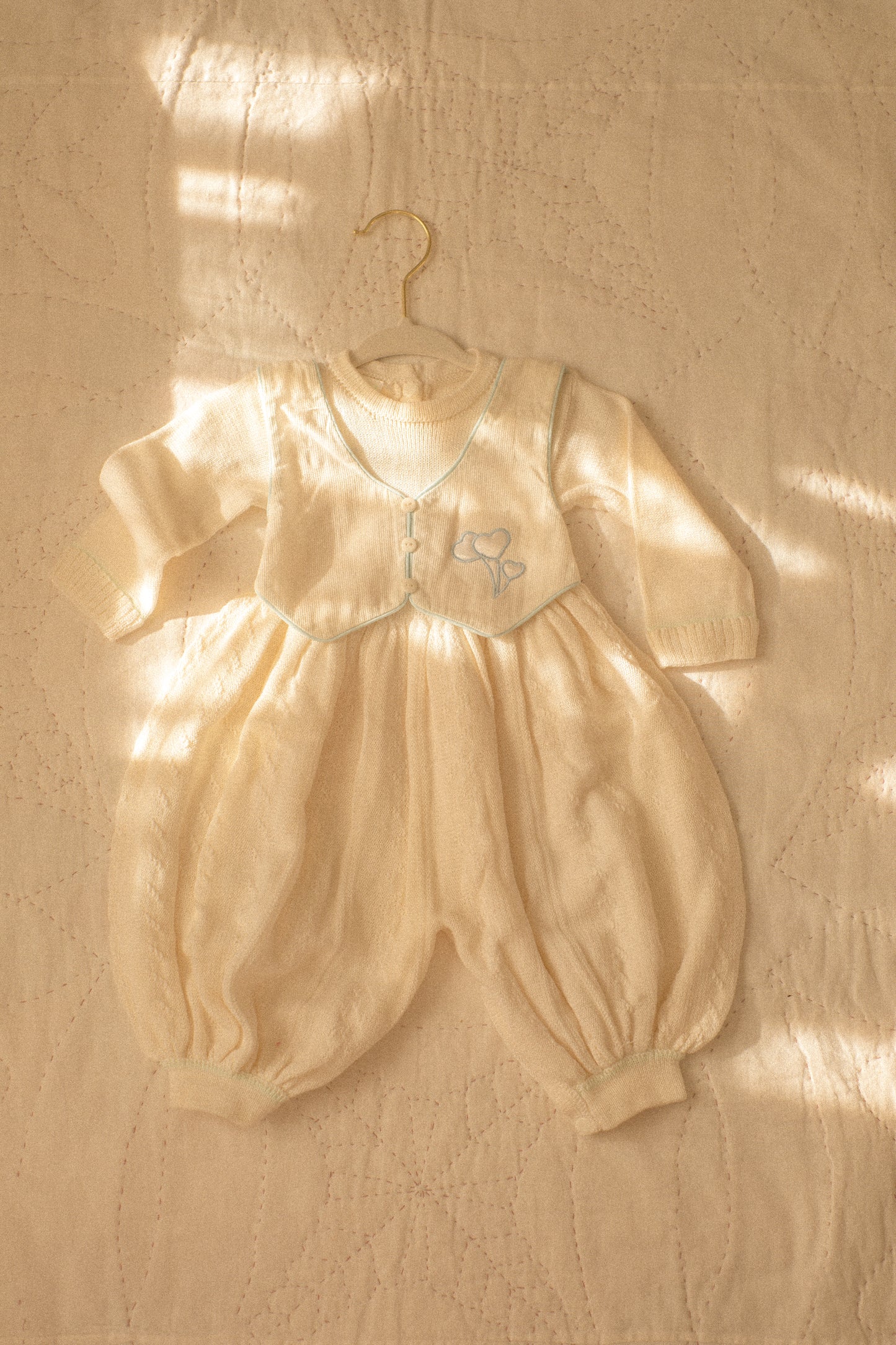 vintage knit baby onesie