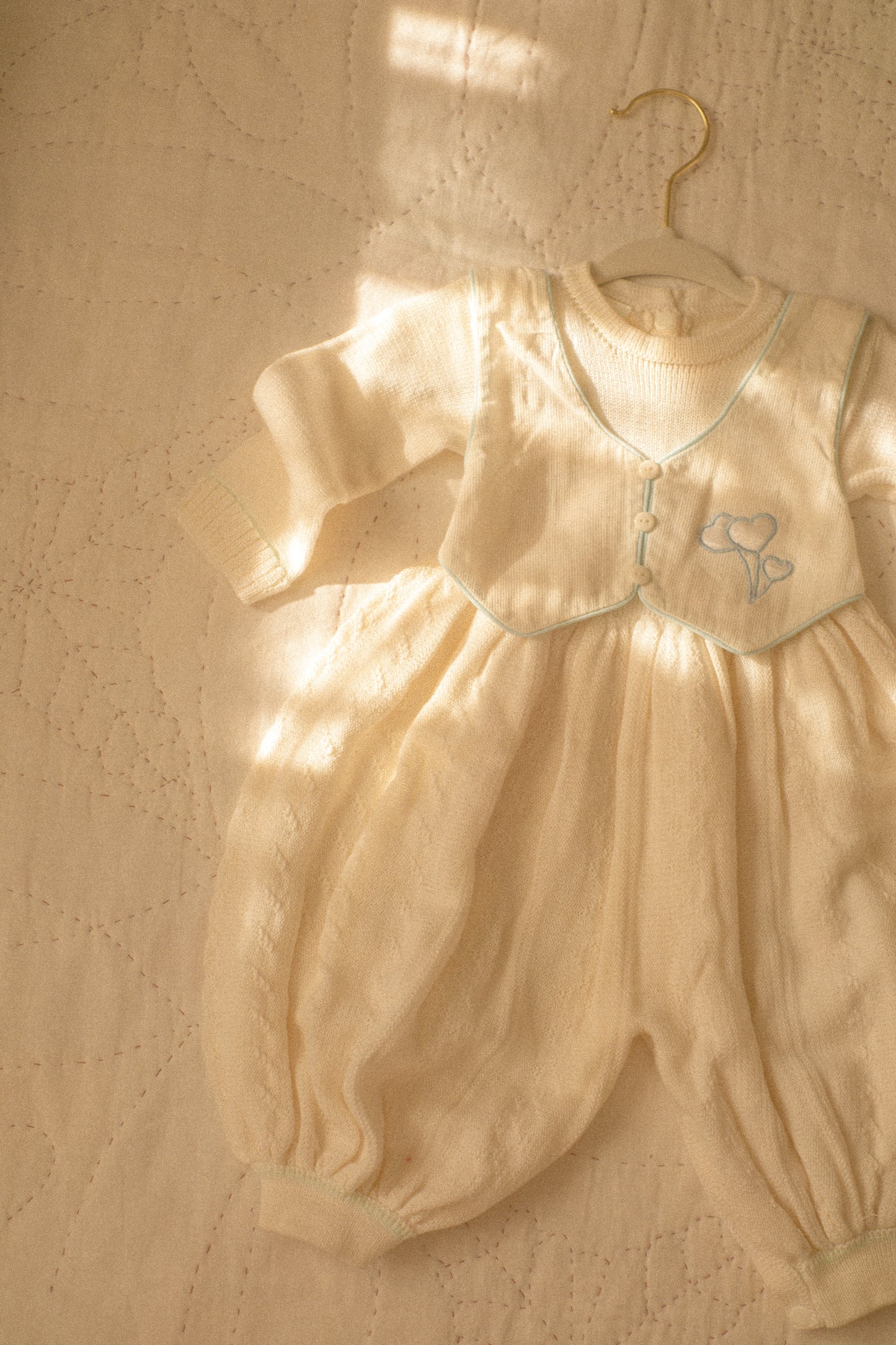 vintage knit baby onesie
