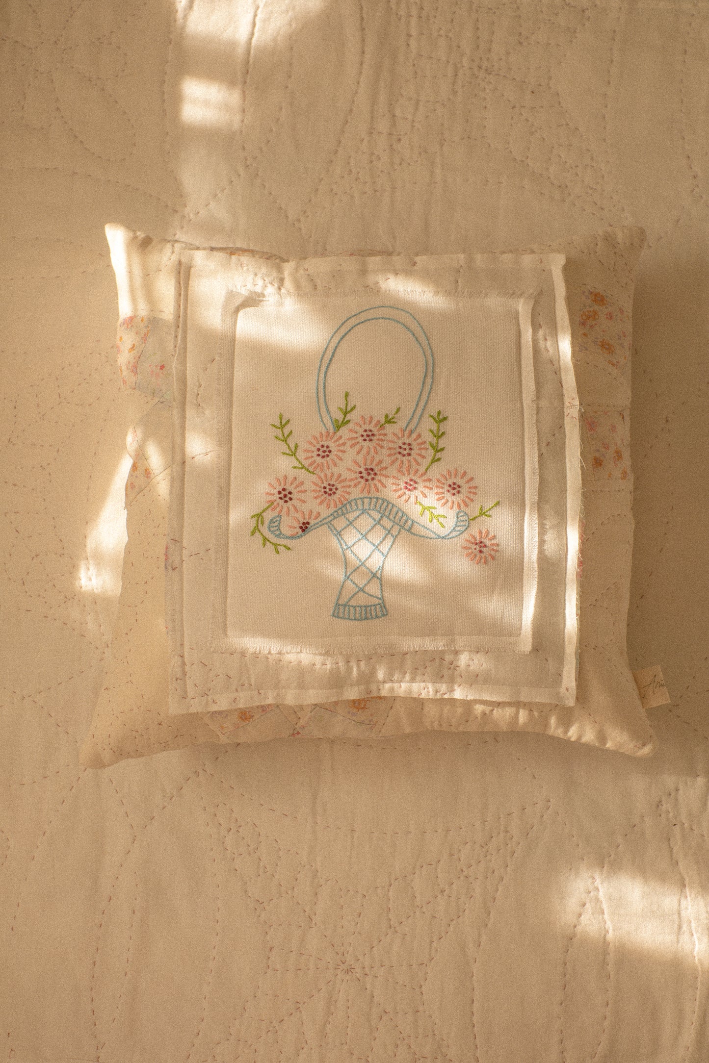 Handmade patchwork quilt embroidered pillow