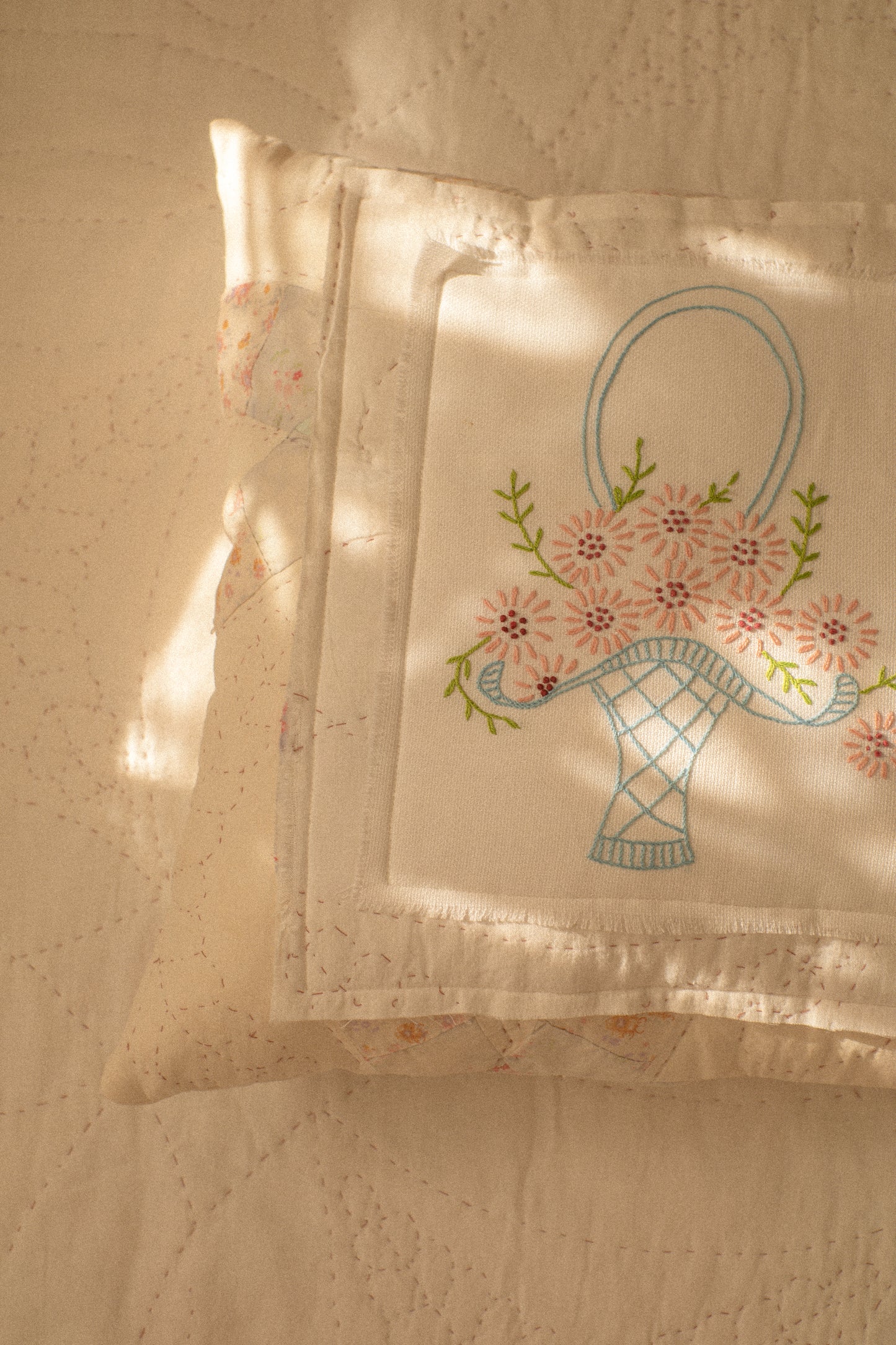 Handmade patchwork quilt embroidered pillow
