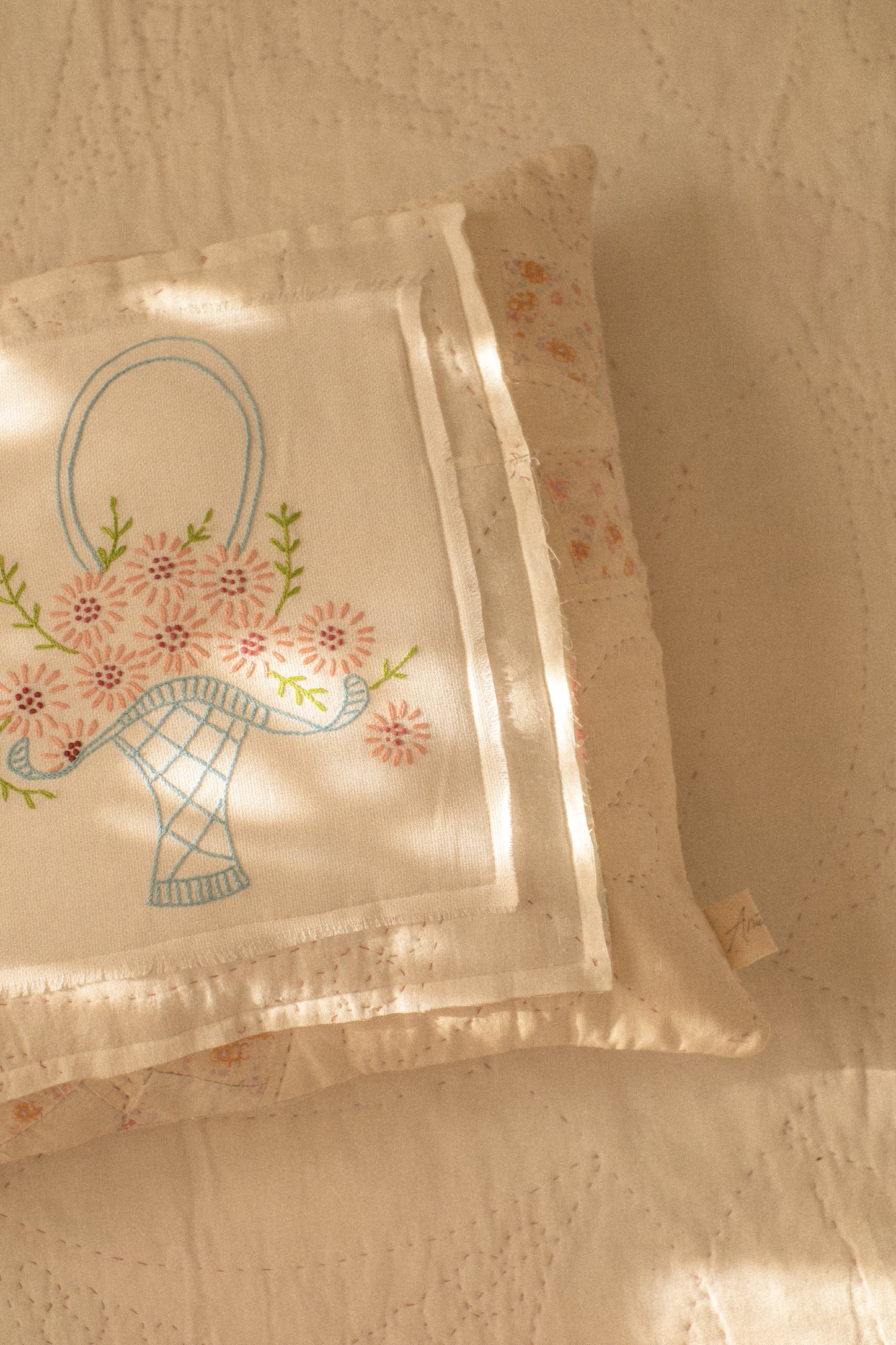 Handmade patchwork quilt embroidered pillow