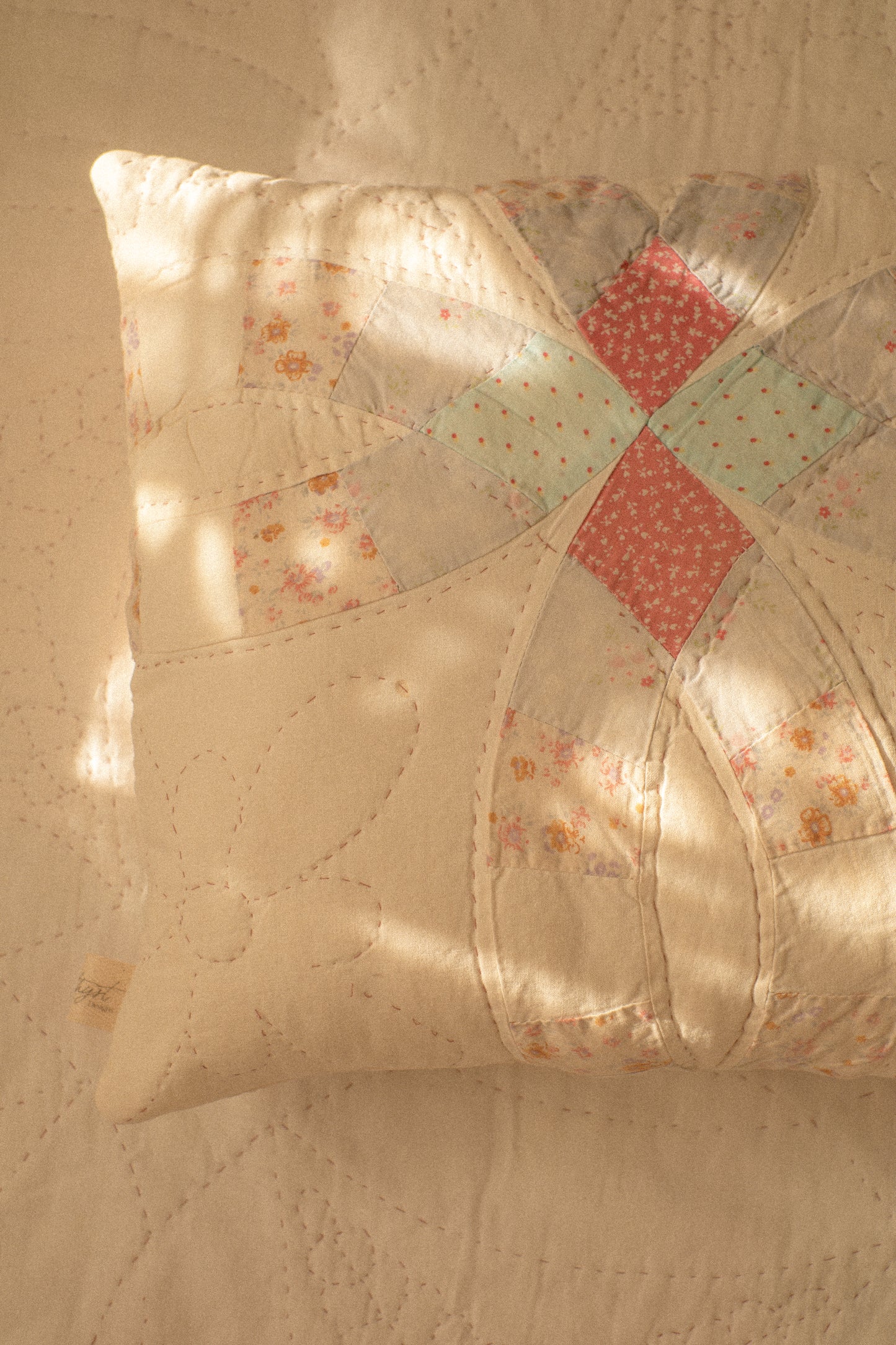 Handmade patchwork quilt embroidered pillow