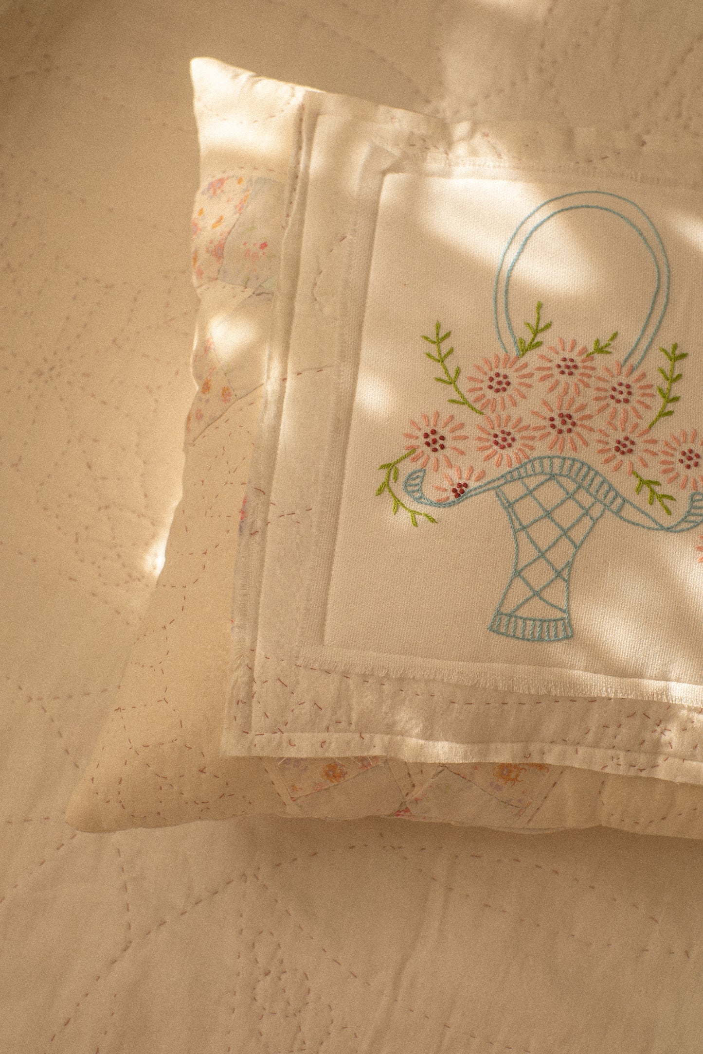 Handmade patchwork quilt embroidered pillow
