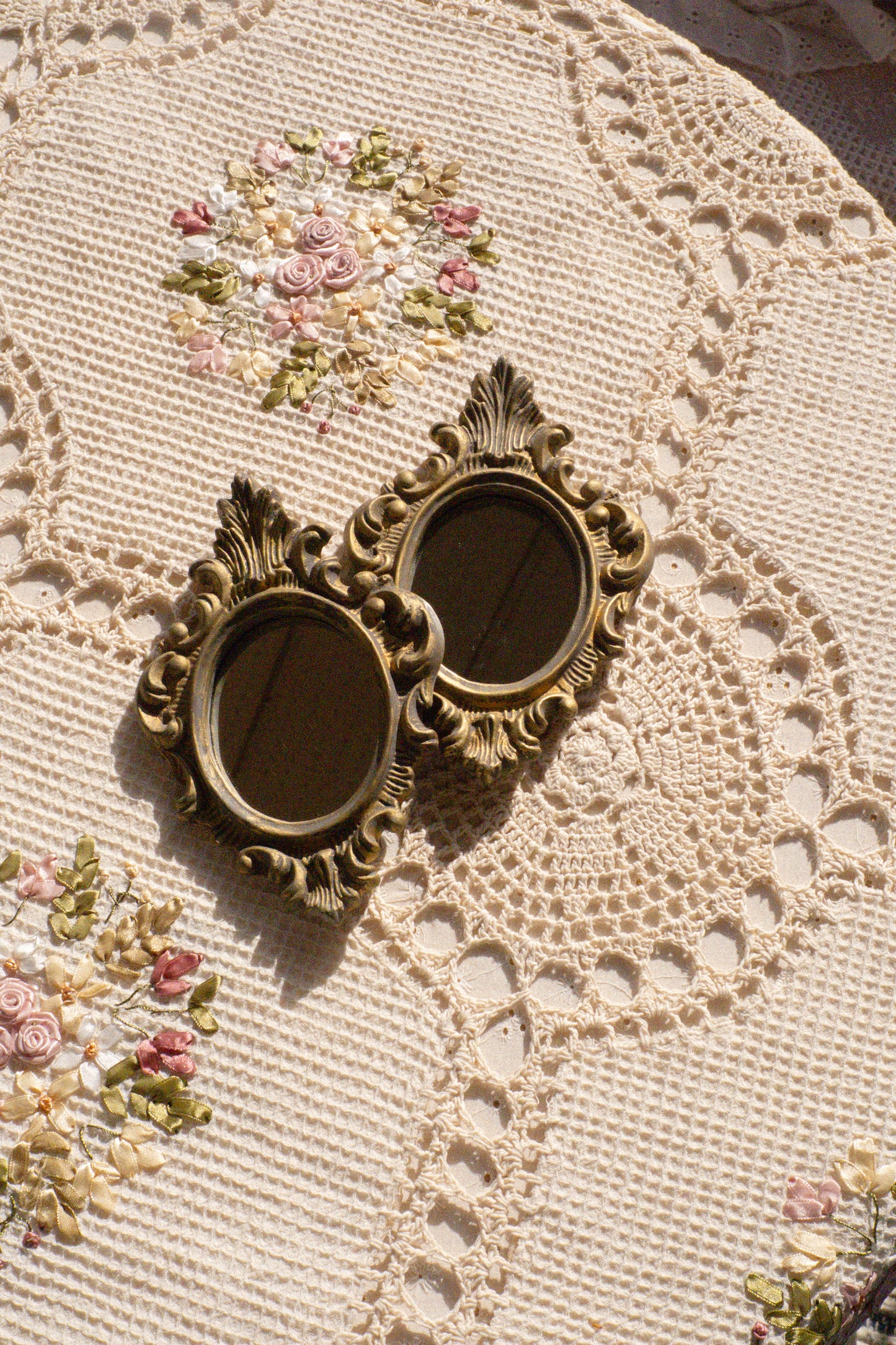 Pair of vintage ornate mirrors