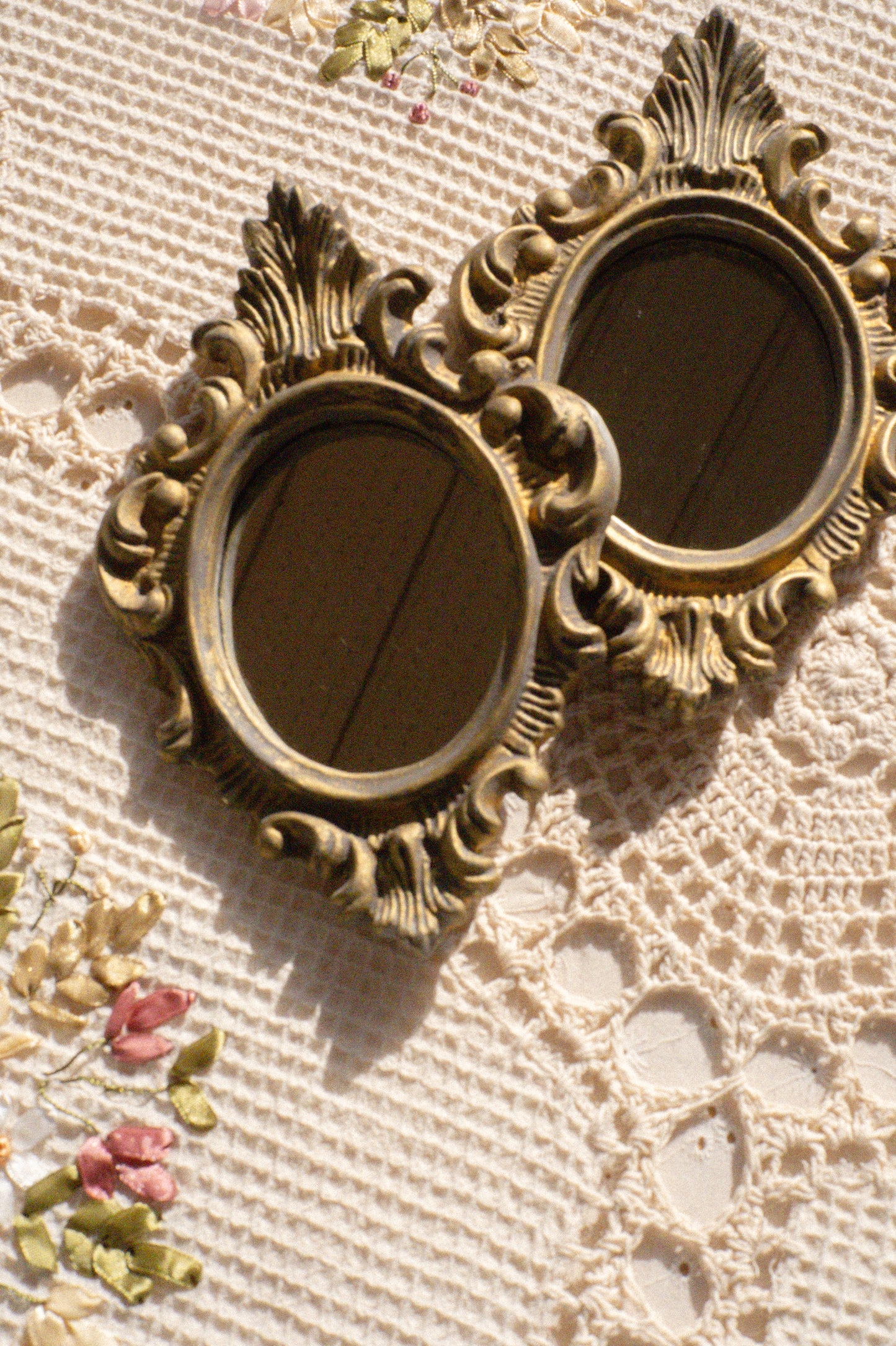 Pair of vintage ornate mirrors
