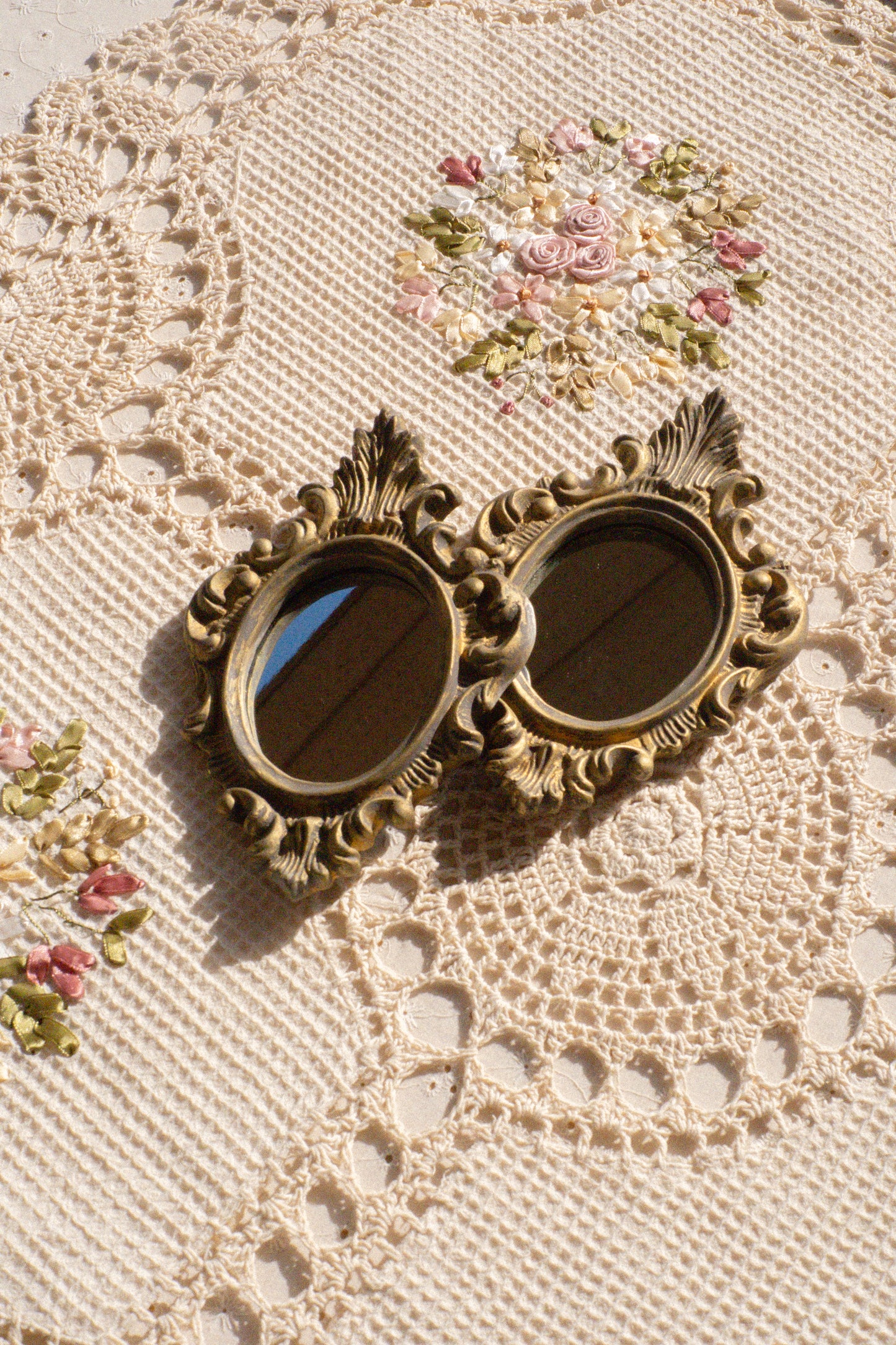 Pair of vintage ornate mirrors