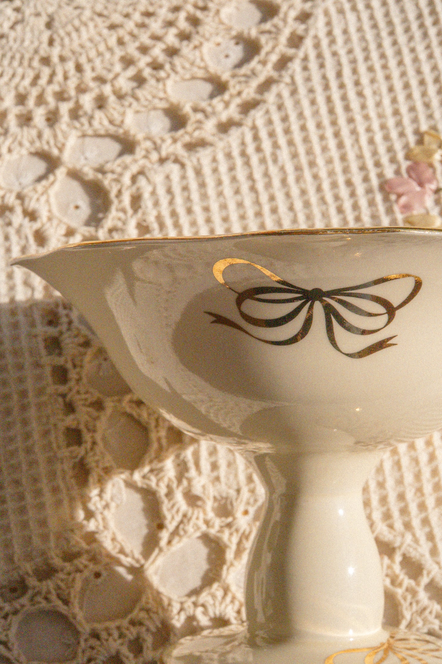 Vintage pedestal bow trinket dish