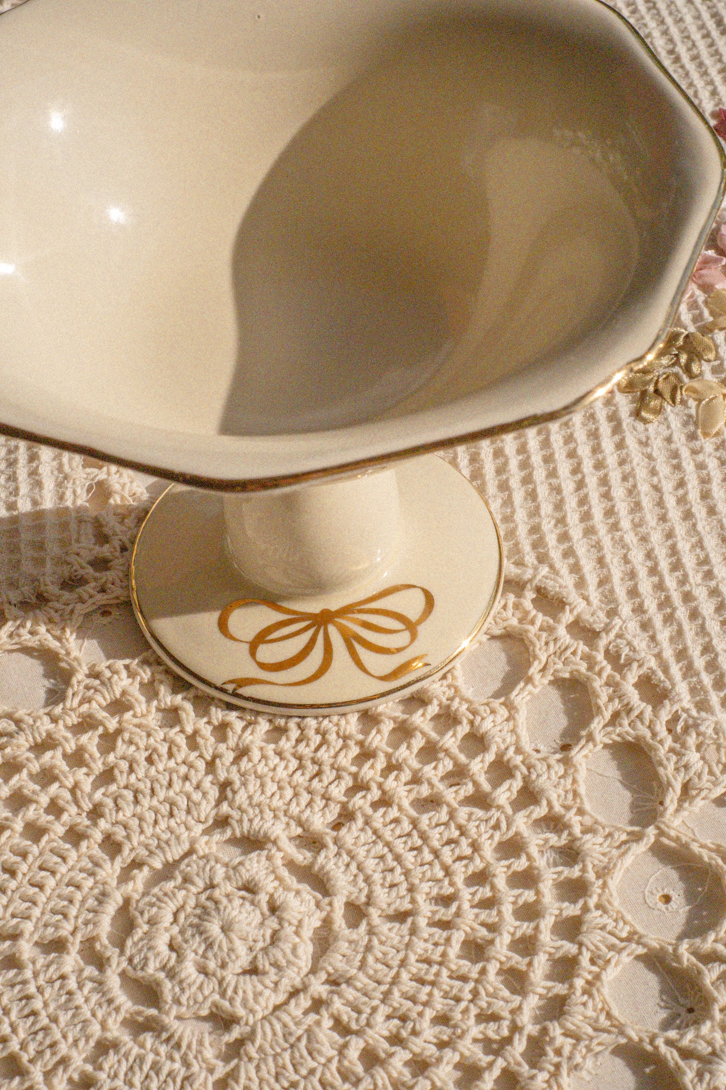 Vintage pedestal bow trinket dish