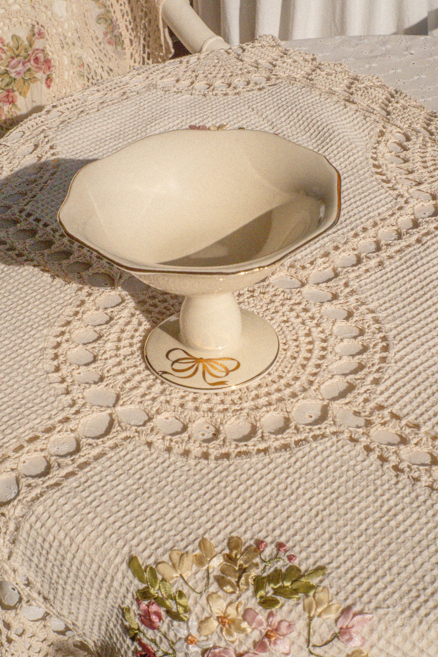 Vintage pedestal bow trinket dish