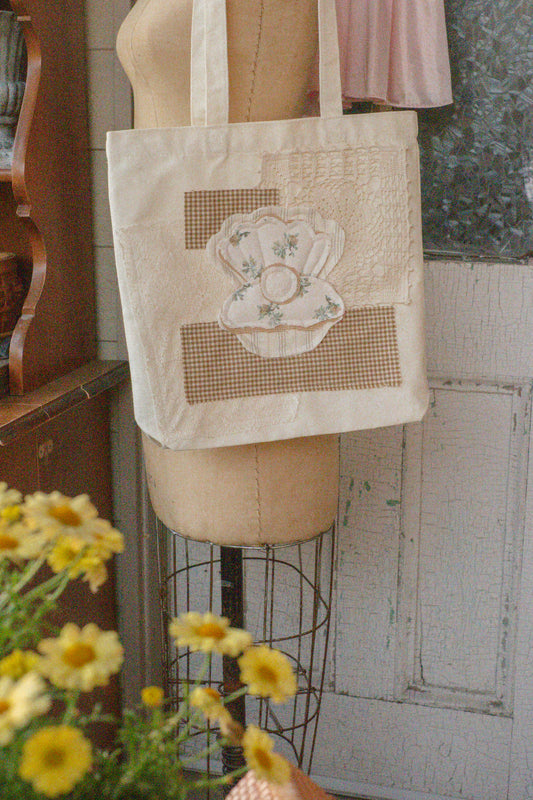 Handmade seashell appliqué tote